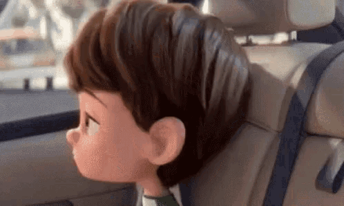 a cartoon boy is sitting in the back seat of a car with a seat belt on .