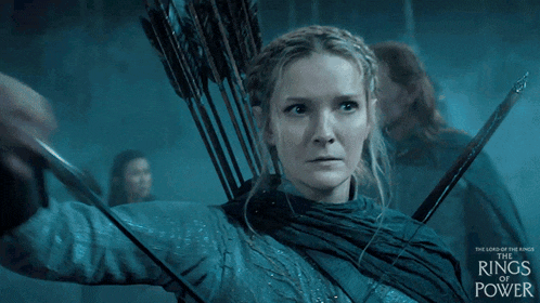 an advertisement for the lord of the rings of power shows a woman holding a bow and arrow