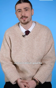 a man wearing a tan sweater and a red tie says j'étais lateral gauche