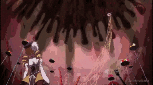 a woman in a corset is standing in front of a giant monster .