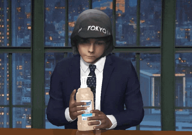 a man in a suit and tie holding a bottle of lysol hand sanitizer