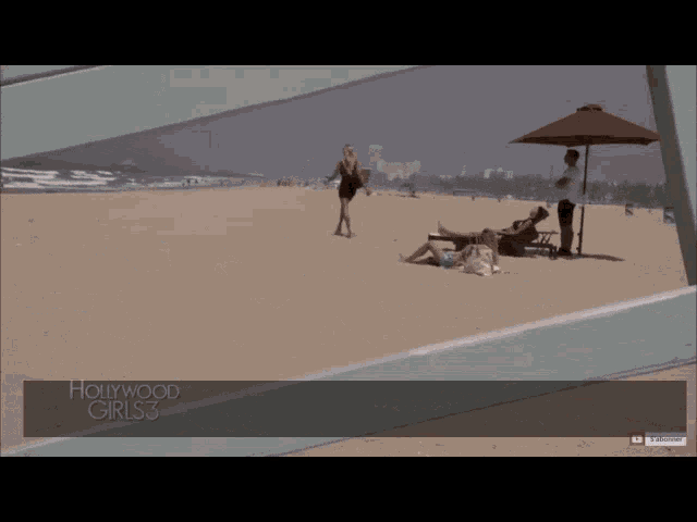a woman walking on a beach with hollywood girls 3 on the bottom right