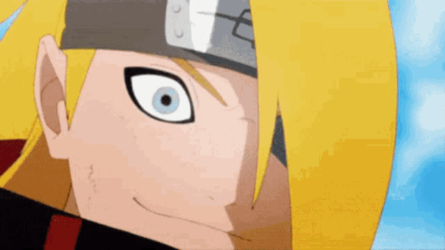 a close up of a cartoon character 's face with yellow hair