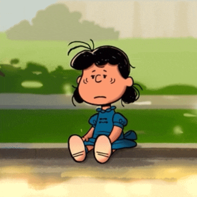 a cartoon character with a sad look on her face is sitting on the sidewalk