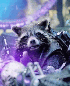 a raccoon wearing a leather vest is sitting in a room with purple lights