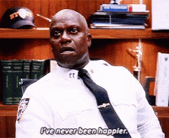 a man in a police uniform and tie says i 've never been happier ..