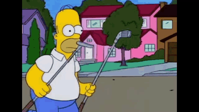 homer simpson from the simpsons is holding a golf club