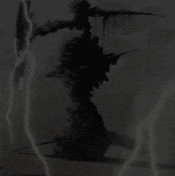 a blurred image of a landscape with a few spots of light on it