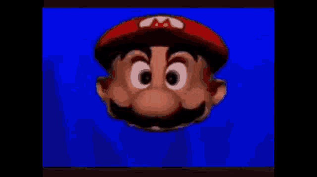 a close up of a cartoon character 's face with a tongue sticking out .
