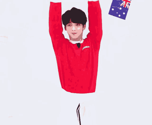 a young man in a red sweater is holding a flag