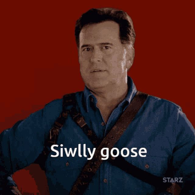 a man in a blue shirt says siwlly goose in front of a red background
