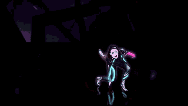 a woman is doing a handstand in a dark room with purple lights