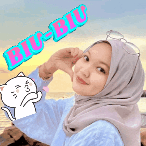 a woman wearing a hijab and glasses is making a heart with her hands and the word biu-biu is above her