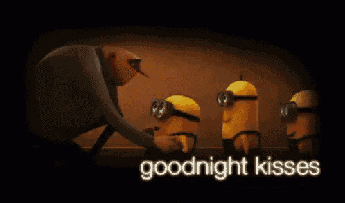 a man is hugging two minions and the words `` goodnight kisses '' are on the bottom of the image .