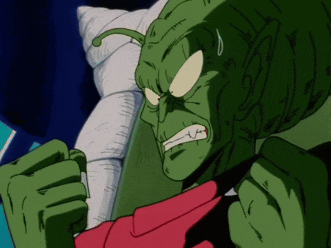 a cartoon of a green monster with a red shirt on