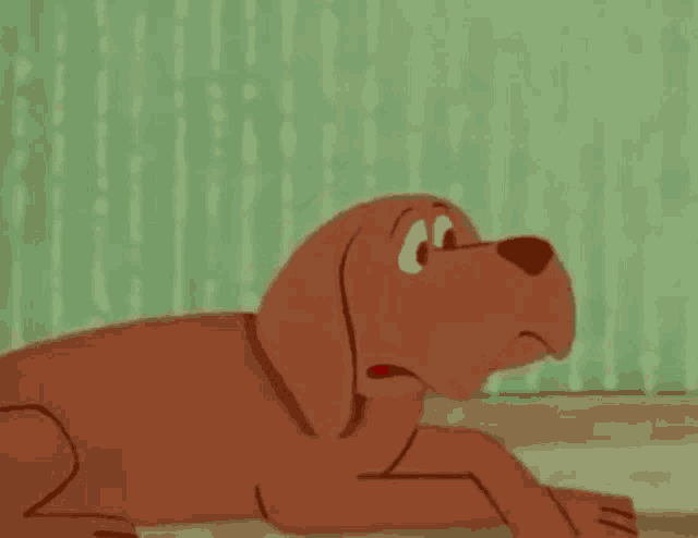 a cartoon dog is laying down with its mouth open .