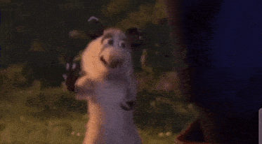 a cartoon sheep is standing next to a tree in the woods .
