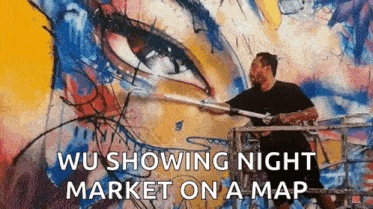 a man is painting a mural on a wall with the words wu showing night market on a map .