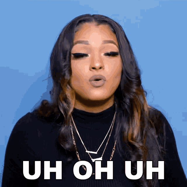 a woman making a funny face with the words uh oh uh above her