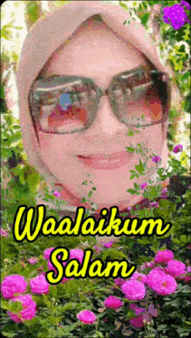 a woman wearing sunglasses and a hijab is surrounded by pink flowers and says waalaikum salam