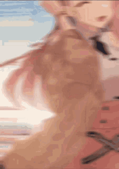 a blurry picture of a girl with pink hair