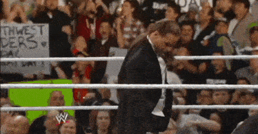 a wrestling ring with a sign that says " thwest ders " on it