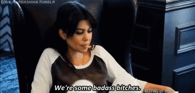 a woman is sitting in a chair and saying `` we 're some badass bitches . ''