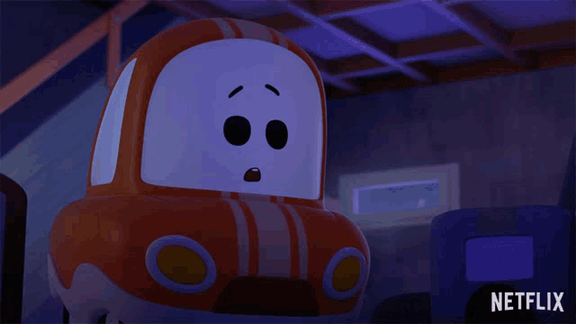 a netflix advertisement with a toy car in the background