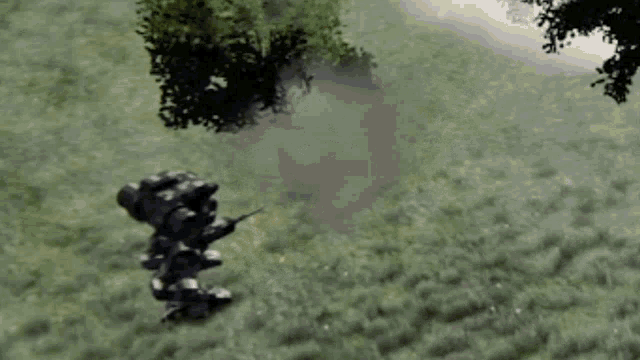 a blurred image of a person holding a gun