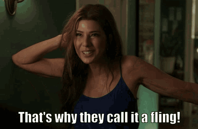 a woman in a blue tank top with the words that 's why they call it a fling