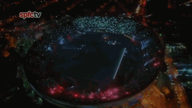 an aerial view of a stadium with spictv written on the top