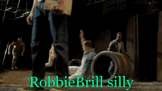 a group of men are jumping over barrels with the words robbiebrill silly written in green