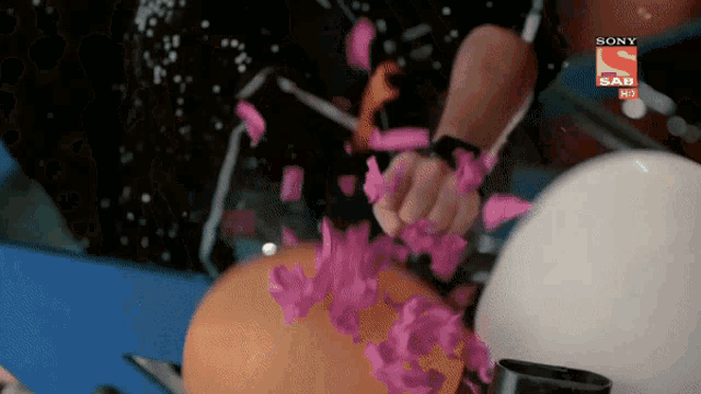 a sony sab hd advertisement shows a person holding a balloon