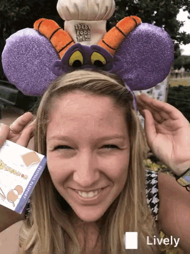 a woman is wearing a headband with a chef hat on it