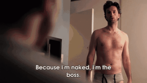 a shirtless man says because i 'm naked i 'm the boss while standing in front of a mirror