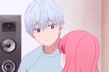 a girl with pink hair looks at a boy with white hair