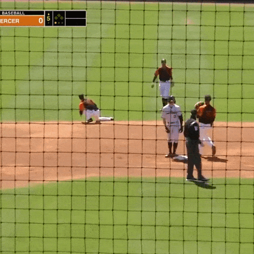 a baseball game is being played with a score of 5 to 0
