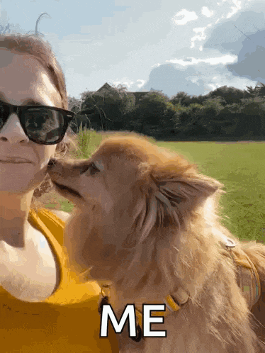 a woman is holding a small brown dog and the dog is looking at the camera with the words me below it