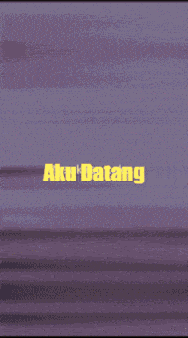a woman wearing a white hijab with the words aku datang written on it