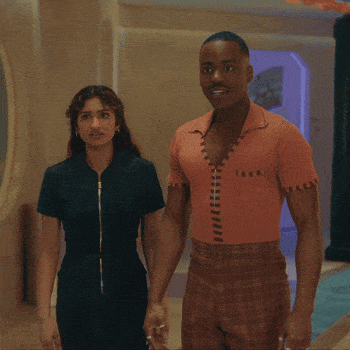 a man and woman standing next to each other with the words hologram explain