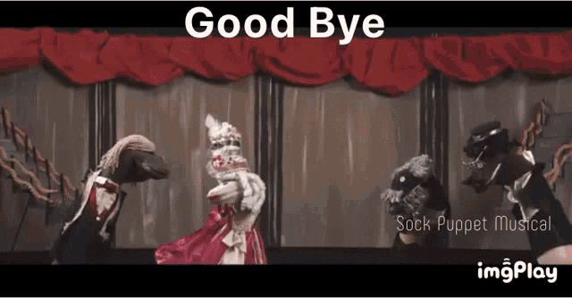 a group of puppets on a stage with the words " good bye " on top