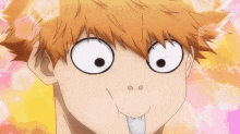 a close up of a person 's face with a surprised look on their face .