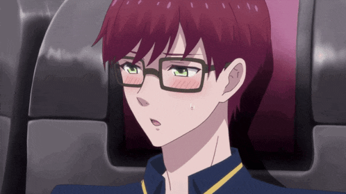 a close up of a person wearing glasses with a surprised look on their face
