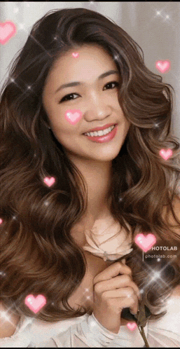 a woman is smiling and holding a rose with hearts around her