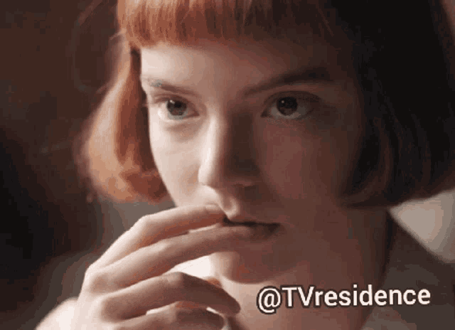 a close up of a woman 's face with the words " @tvresidence " below her