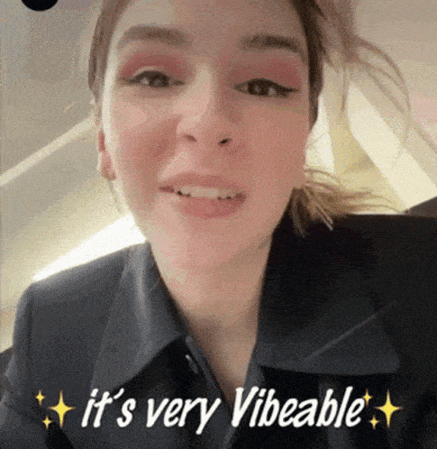 a woman says " it 's very vibeable " in a video