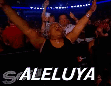 a woman with her arms in the air with the words saleluya written below her
