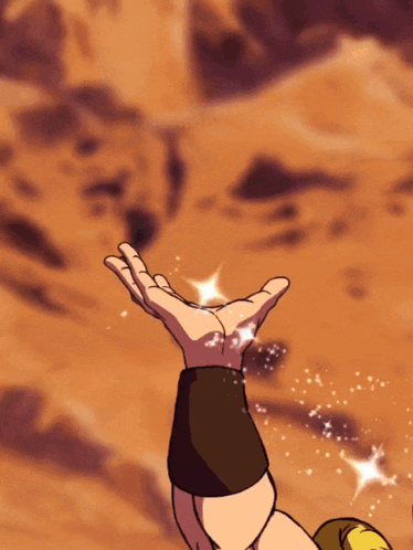 a hand is reaching out towards a green sphere