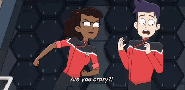 a man and a woman in star trek uniforms are standing next to each other and the man says " are you crazy "