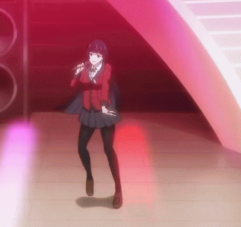 a girl in a school uniform is singing into a microphone .